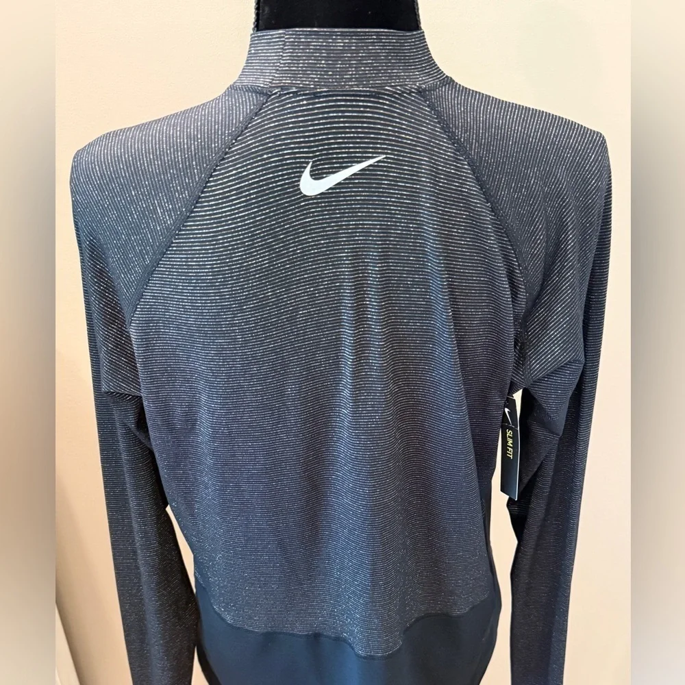 Women’s NWT NIKE Pro Dri-Fit Black/Gold metallic long sleeve top. Size XL